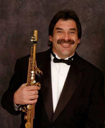 Daniel Jordan holding sax