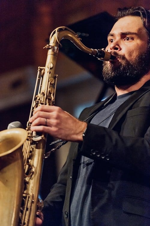 Ryan Devlin playing sax