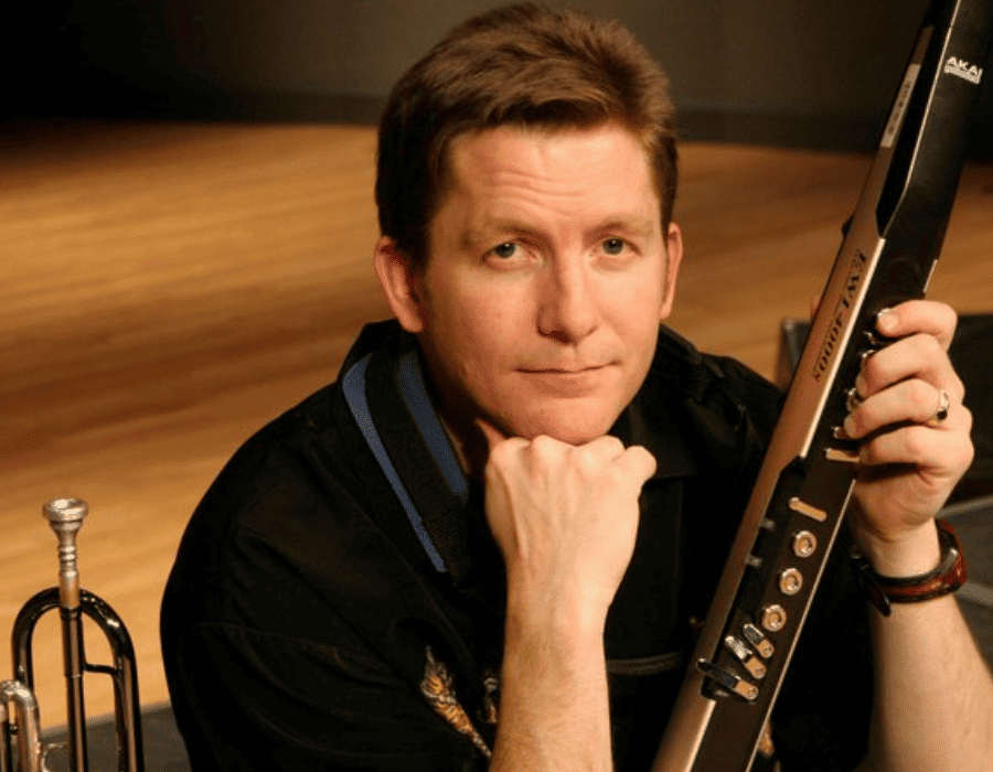 Scott Wilson Scott Wilson holding instrument